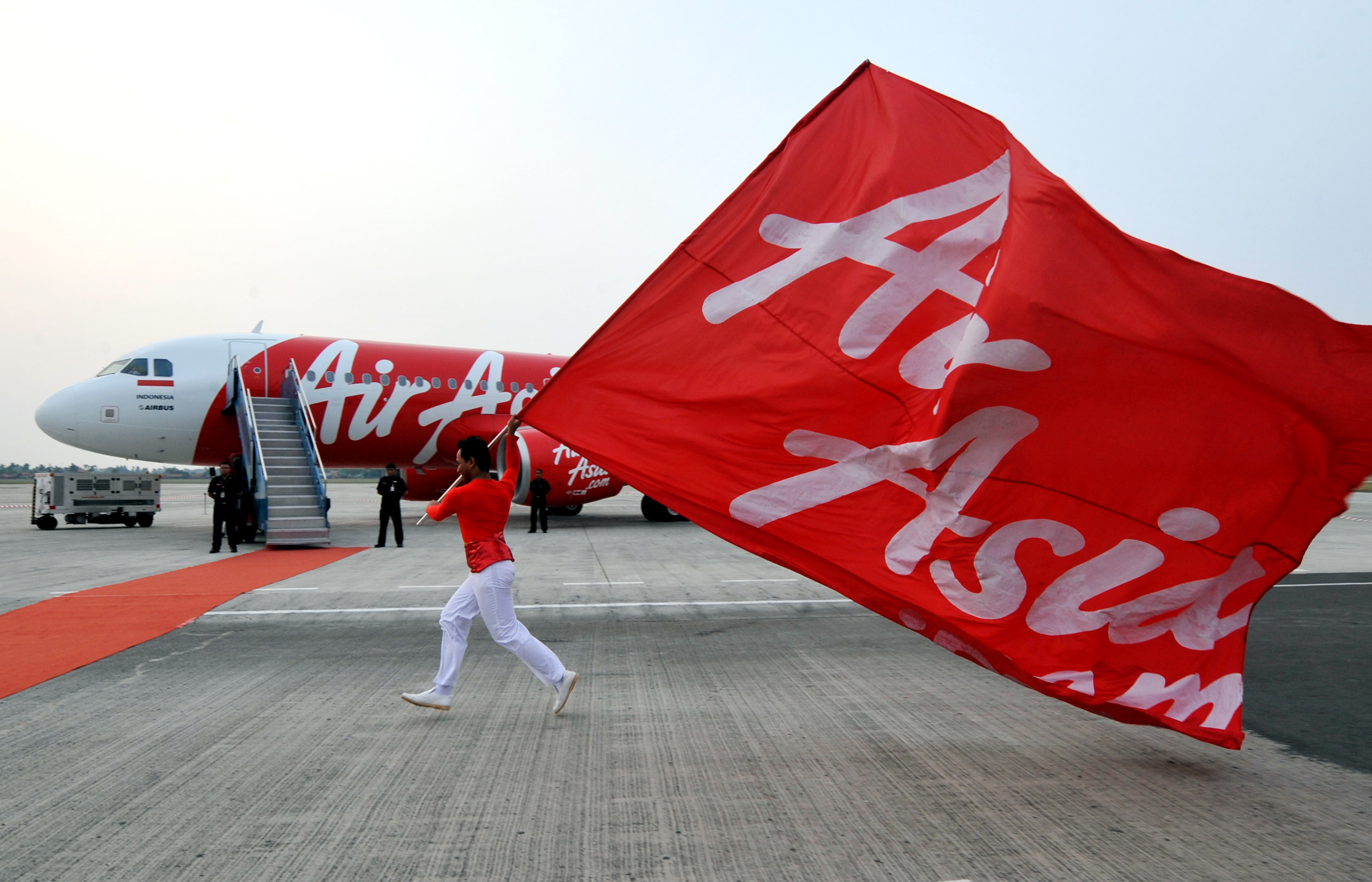 Carry air. Значок Indonesia AIRASIA. AIRASIA Japan. AIRASIA фото.